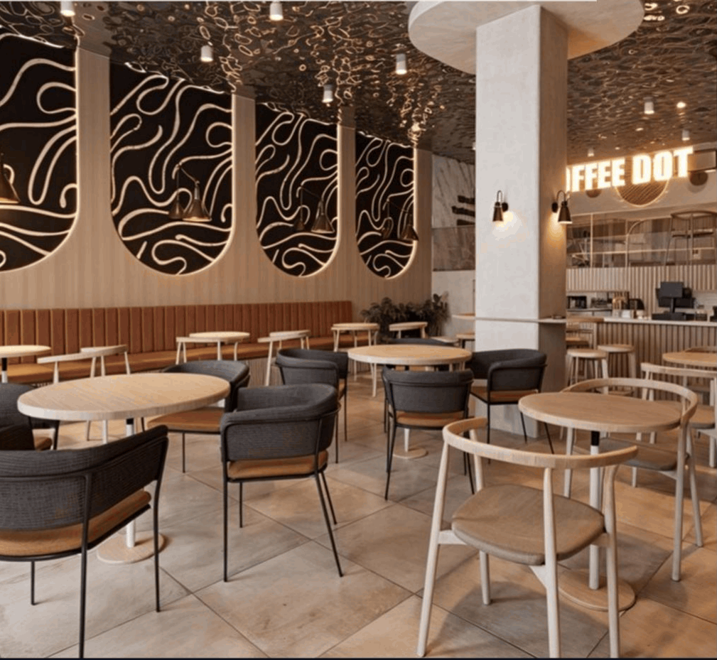 Coffee Dot Islamabad — mezzanine, bar counter, and signage